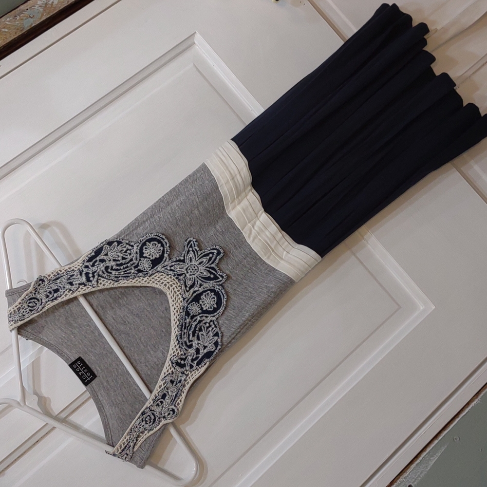Tank with smock tie